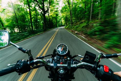 how to listen to music on motorcycle: why do we choose specific songs when riding?